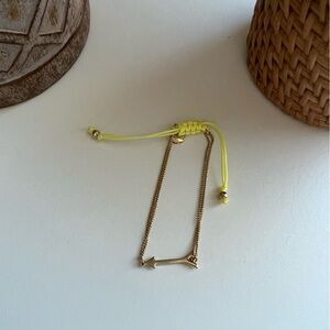 Stella and Dot Gold Arrow Bracelet with Yellow Adjustable Cord